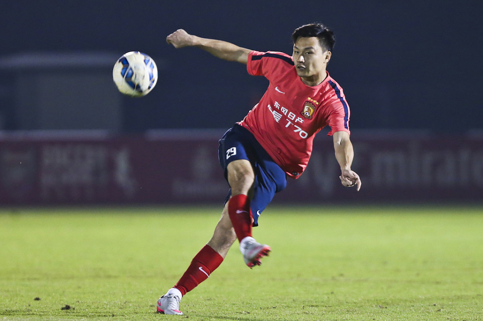 区的球迷认, 广州队立下, 的关系